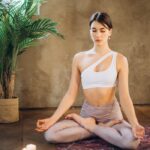 Woman Meditating in Lotus Pose
